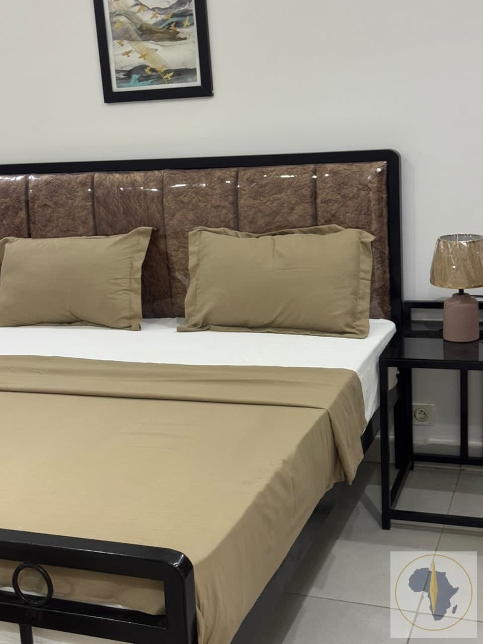 chambre suite spacieuse avec salon — Appartement en location saisonnière à Louga — OroSira Immo